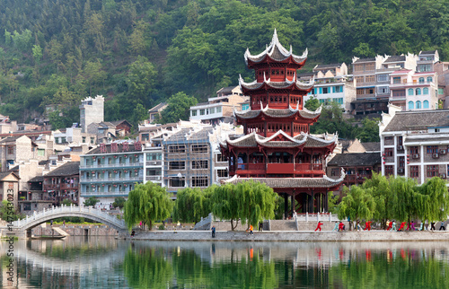 Beautiful pagoda in Zhenyuan Ancient Town on Wuyang river in Guizhou Province, China photo