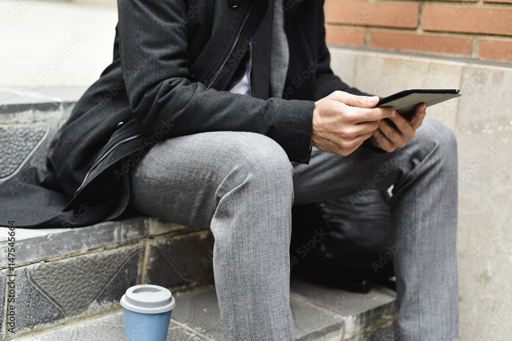 young businessman using a tablet young businessman using a tablet