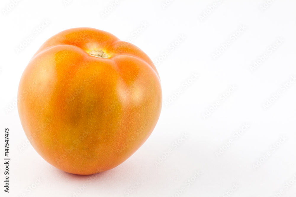 Tomato ( Lycopersicon esculentum) isolated in white background Tomato ( Lycopersicon esculentum) isolated in white background