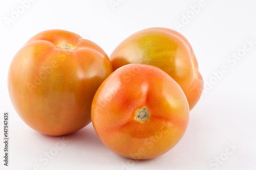 Tomato ( Lycopersicon esculentum) isolated in white background