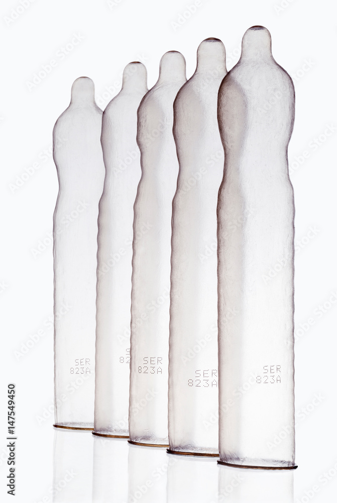 Condom Rows Image Inflated condoms standing in row Stock Photo | Adobe Stock