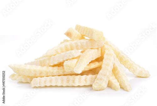 Abundant frozen French fries on white background
