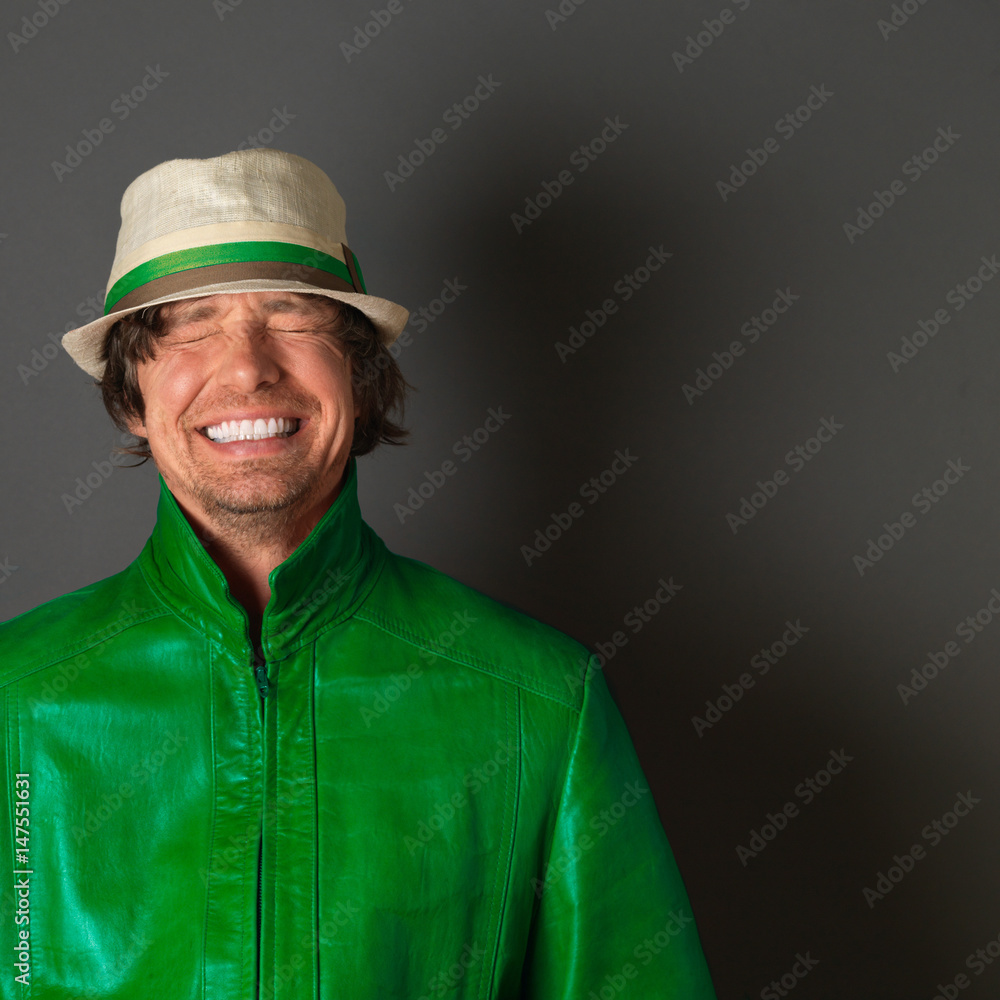 Smiling man wearing green jacket Smiling man wearing green jacket