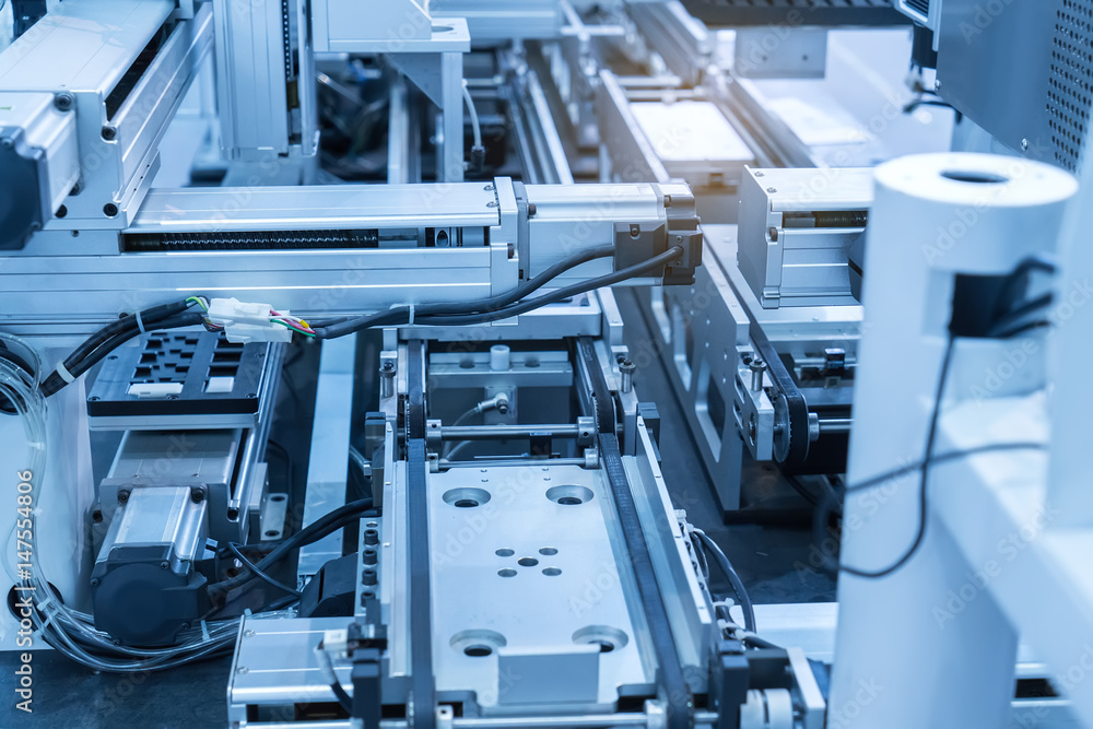 robotic arm machine tool at industrial manufacture plant,Smart factory industry 4.0 concept. robotic arm machine tool at industrial manufacture plant,Smart factory industry 4.0 concept.