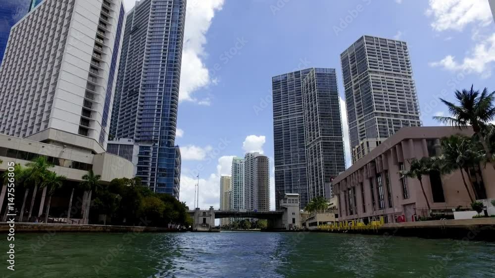 Miami Fl Traveling By Boat Through River Looking at City Center Skyline Hotels, Condos, and Apartment Buildings Miami Fl Traveling By Boat Through River Looking at City Center Skyline Hotels, Condos, and Apartment Buildings