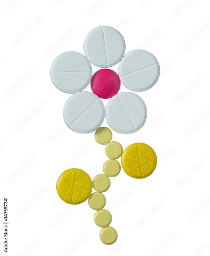 Daisy Flower made of different colorful pills isolated on white background Daisy Flower made of different colorful pills isolated on white background