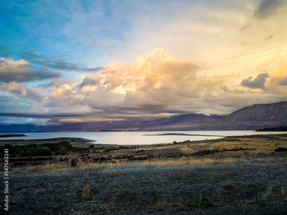 Fototapeta premium Idyllic lake Tekapo, Canterbury Region, New Zealand - Stock Image