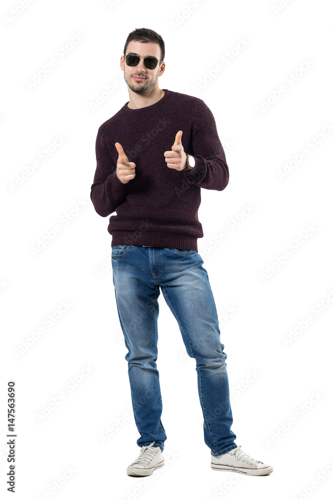 Friendly happy casual man choosing you pointing finger at camera. Full body length portrait isolated over white studio background. Friendly happy casual man choosing you pointing finger at camera. Full body length portrait isolated over white studio background.