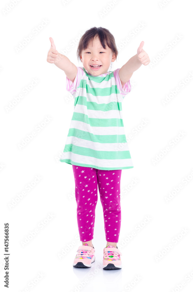 Little asian girl showing thumbs up over white background Little asian girl showing thumbs up over white background