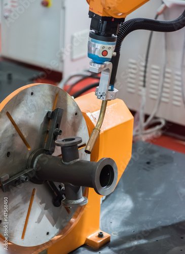 Industrial robotic arm for welding.