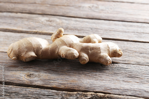 Ginger root on grey wooden table