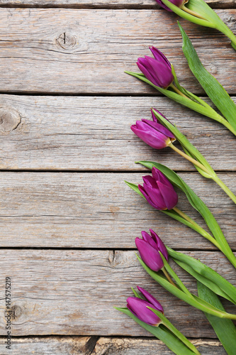 Fototapeta Naklejka Na Ścianę i Meble -  Bouquet of tulips on a grey wooden table
