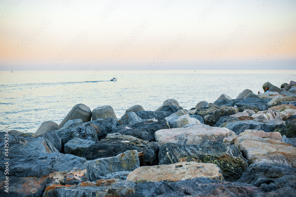 View of the sea from the stone beach. View of the sea from the stone beach.