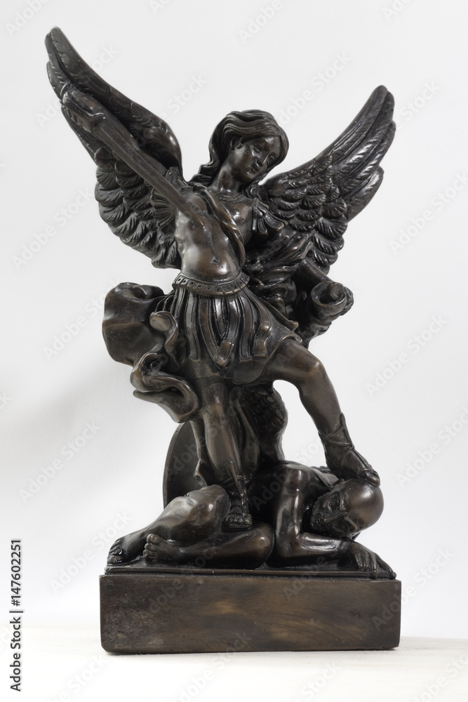 Michael Archangel Wood with clipping path. the war in heaven he defeats Satan. 
