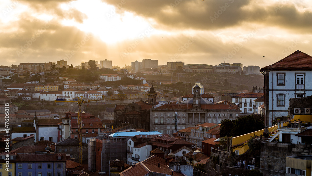 Fototapeta premium Golden rays of Light over the City Porto, Portugal