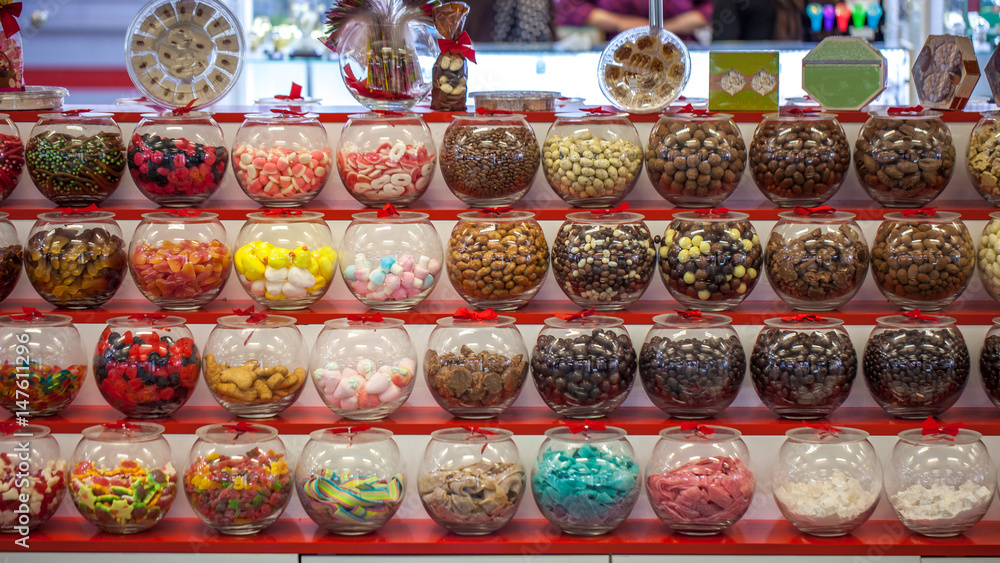 Filled glass candy jars at the fair