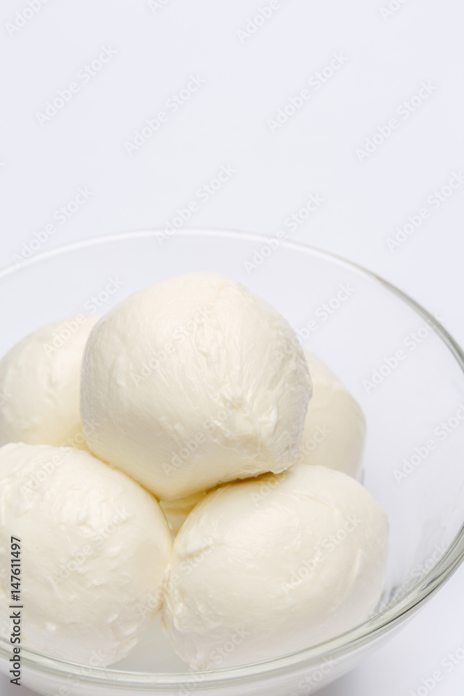 Mozzarella In a glass plate isolated on white Mozzarella In a glass plate isolated on white