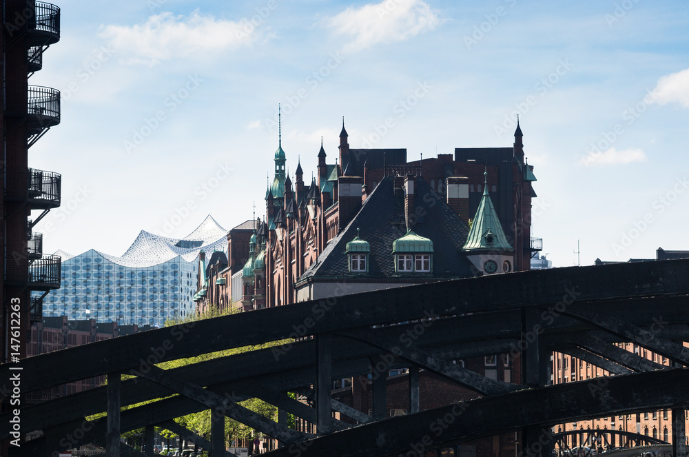 Hamburg, historical storage quarter with Elbe Philharmonic Hall in the background in the Harbor area