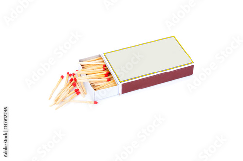 Matchbox with red matches isolated on white background