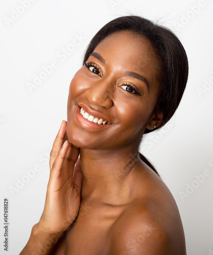 beauty portrait of a happy woman isolated on white