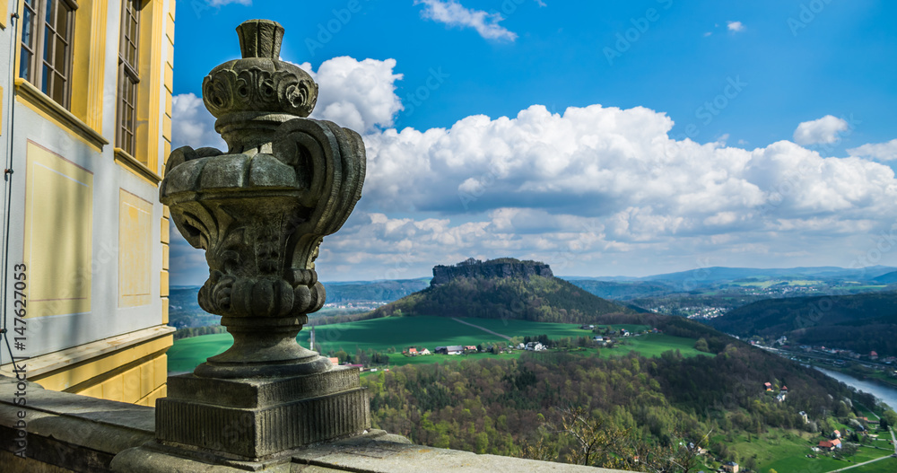 Decorative vase in fortress of Koenigstein in front of Elba river and saxon mountains