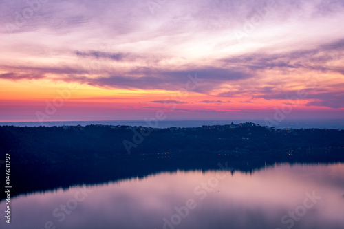 Castel Gandolfo town above the Albano Lake, outside Rome, Italy, with Papal summer residence visible, at sunset © t0m15