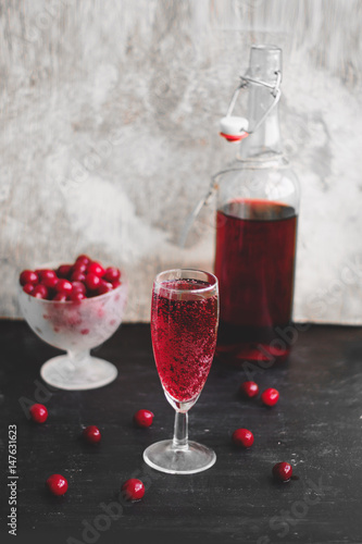 glass of homemade sparkling cherry wine