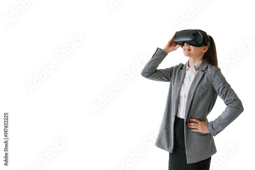 Woman with glasses of virtual reality. Future technology concept. Modern imaging technology. On a white background.