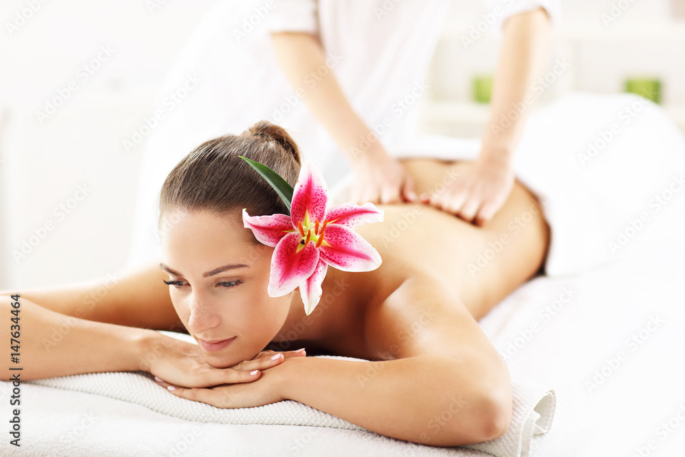 Beautiful woman getting massage in spa Beautiful woman getting massage in spa