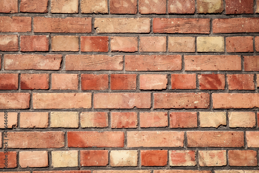 Wall of red large bricks. Brickwall texture close up view. Pattern of red stone blocks Wall of red large bricks. Brickwall texture close up view. Pattern of red stone blocks