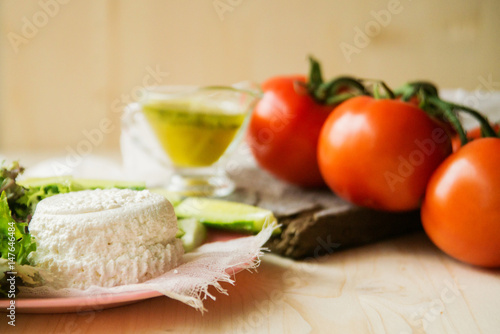 Plate of Healthy Classic Caprese Salad with Mozzarella Cheese, Tomatoes and Basil