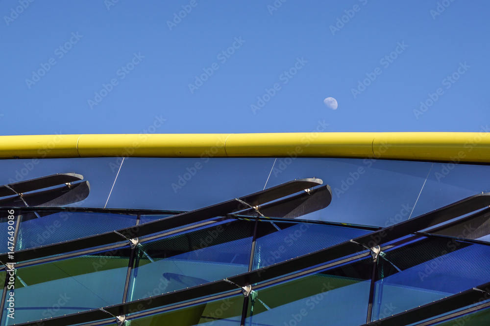 Modern glass silhouettes on modern building.