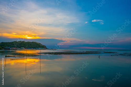 sunset sea view oyster farm © Kittichet
