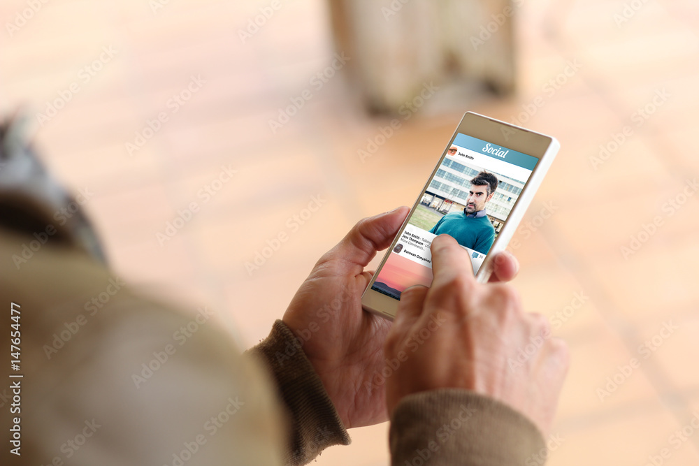 Brown young man smartphone social photo network Brown young man smartphone social photo network