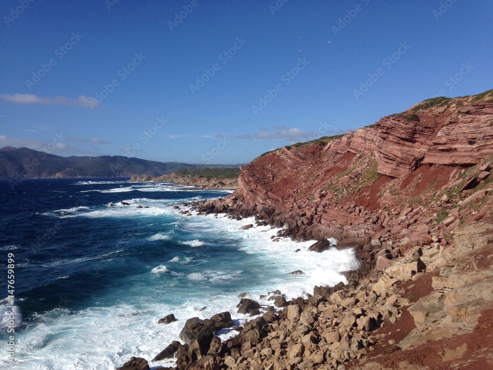 rocky coast at porticciolo, alghero, sardinia, italy