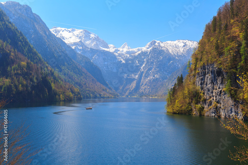 Lake Koenigssee at Schoenau, Berchtesgaden Bavaria Germany on a sunny day with electric ships