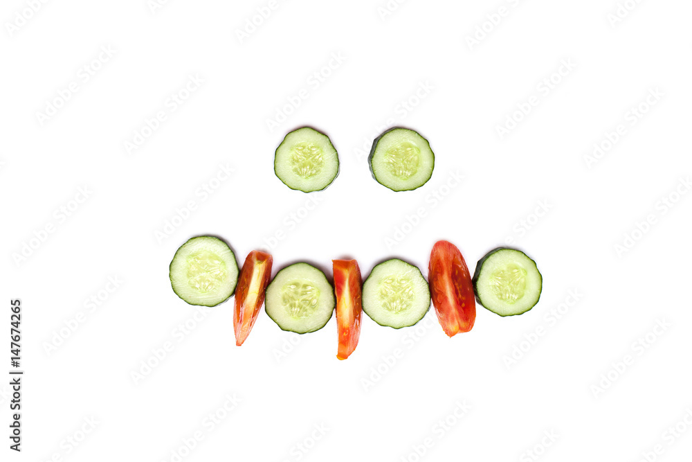 Sliced cucumber and tomato on a white background
Sliced cucumber and tomato on a white background