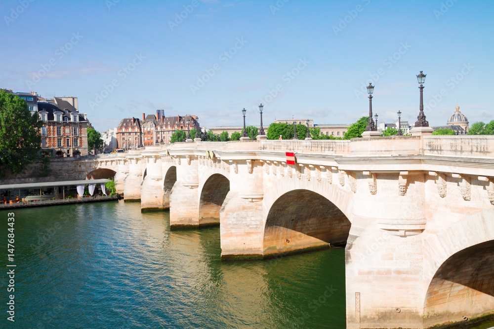 Pont Neuf and river Seine waters at sunny summer day, Paris, France