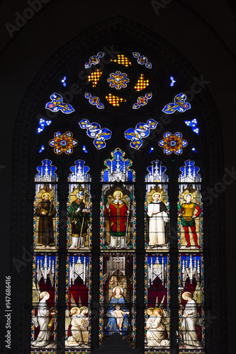 A decorated window indoor of the Saint Petronio Cathedral in Bologna