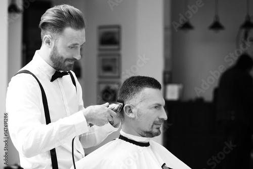 Barber making modern male h...