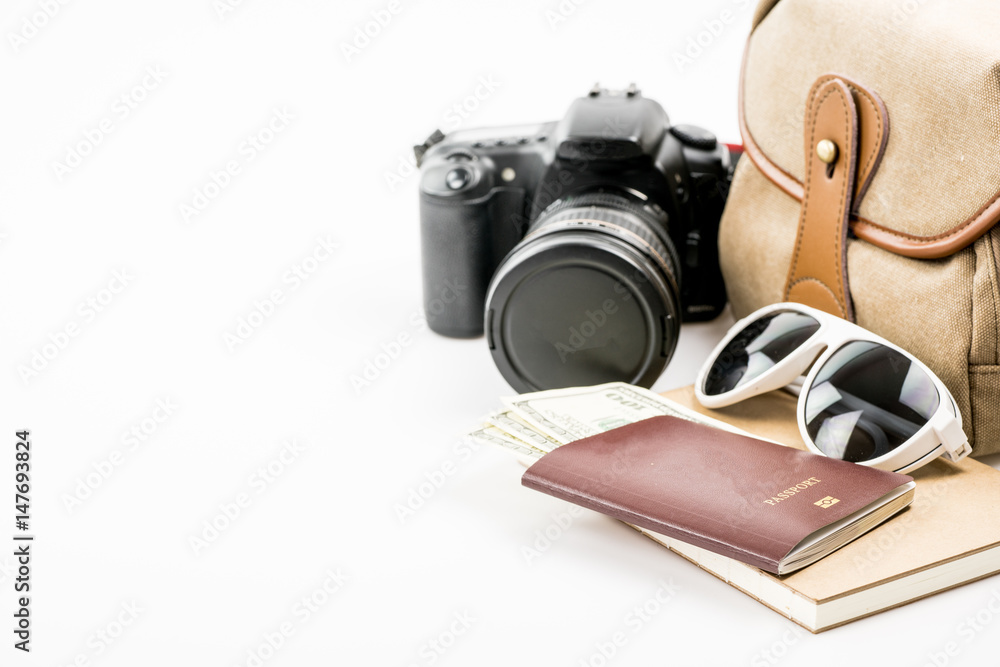  Traveler's accessories and items on white.