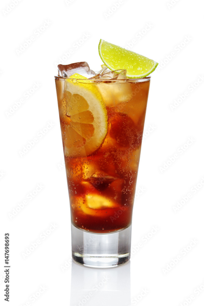 Cocktail whiskey with cola, ice, lemon and lime in highball glass isolated on white. Cocktail whiskey with cola, ice, lemon and lime in highball glass isolated on white.