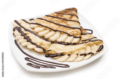 Crepes with chocolate cream and banana