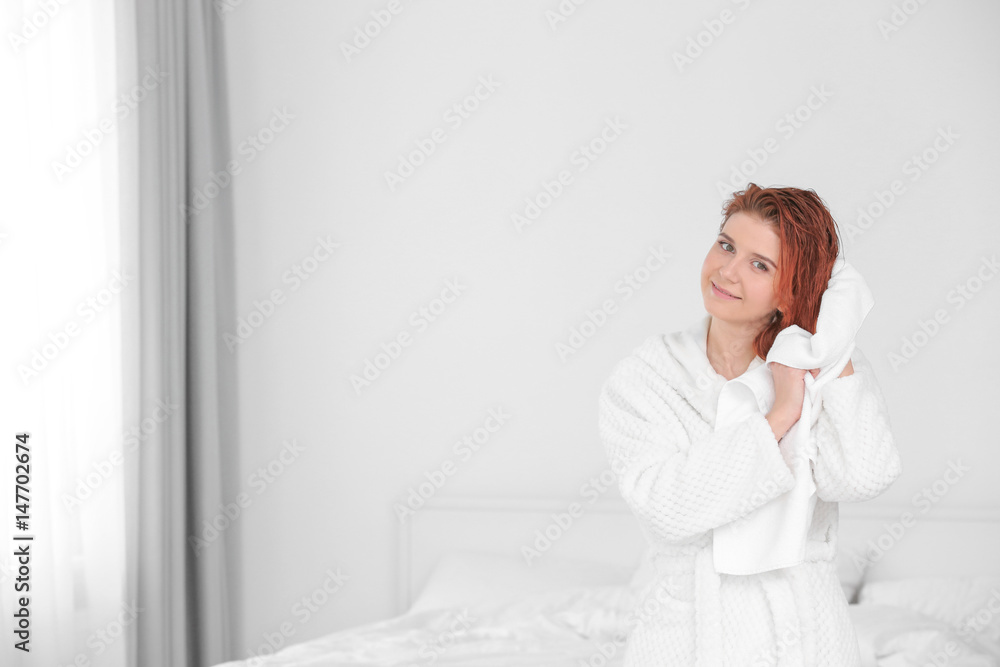 Obraz premium Beautiful young woman after shower at home
