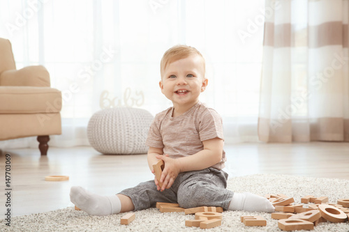 Cute little child playing w...