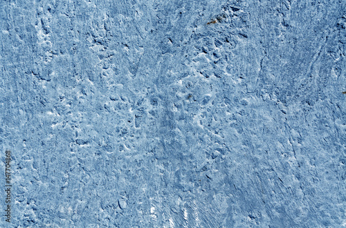Blue color weathered cement wall pattern.
