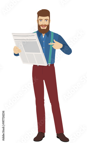 Hipster pointing at a newspaper