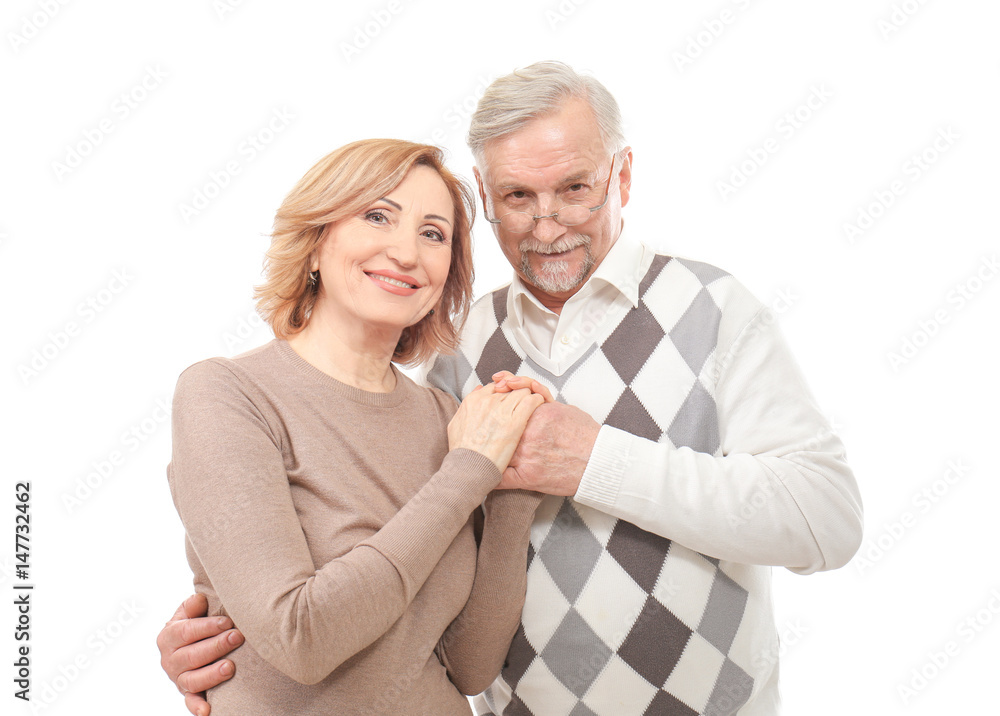 Happy senior couple holding hands isolated on white Happy senior couple holding hands isolated on white
