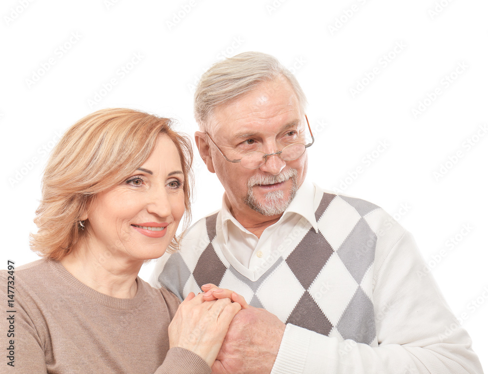Happy senior couple holding hands isolated on white Happy senior couple holding hands isolated on white