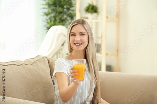 Beautiful young woman with ...
